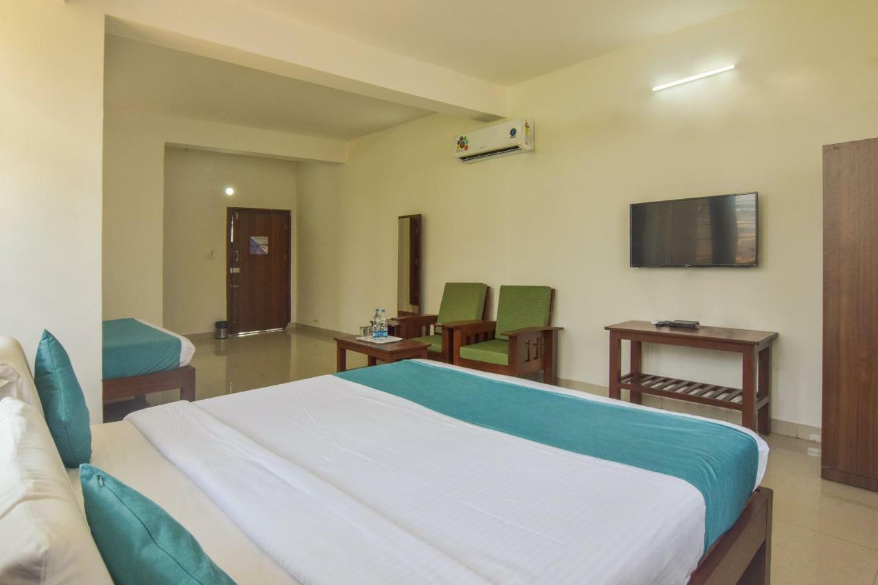 Capital O 14144 Hotel Moriz Madikeri Dış mekan fotoğraf