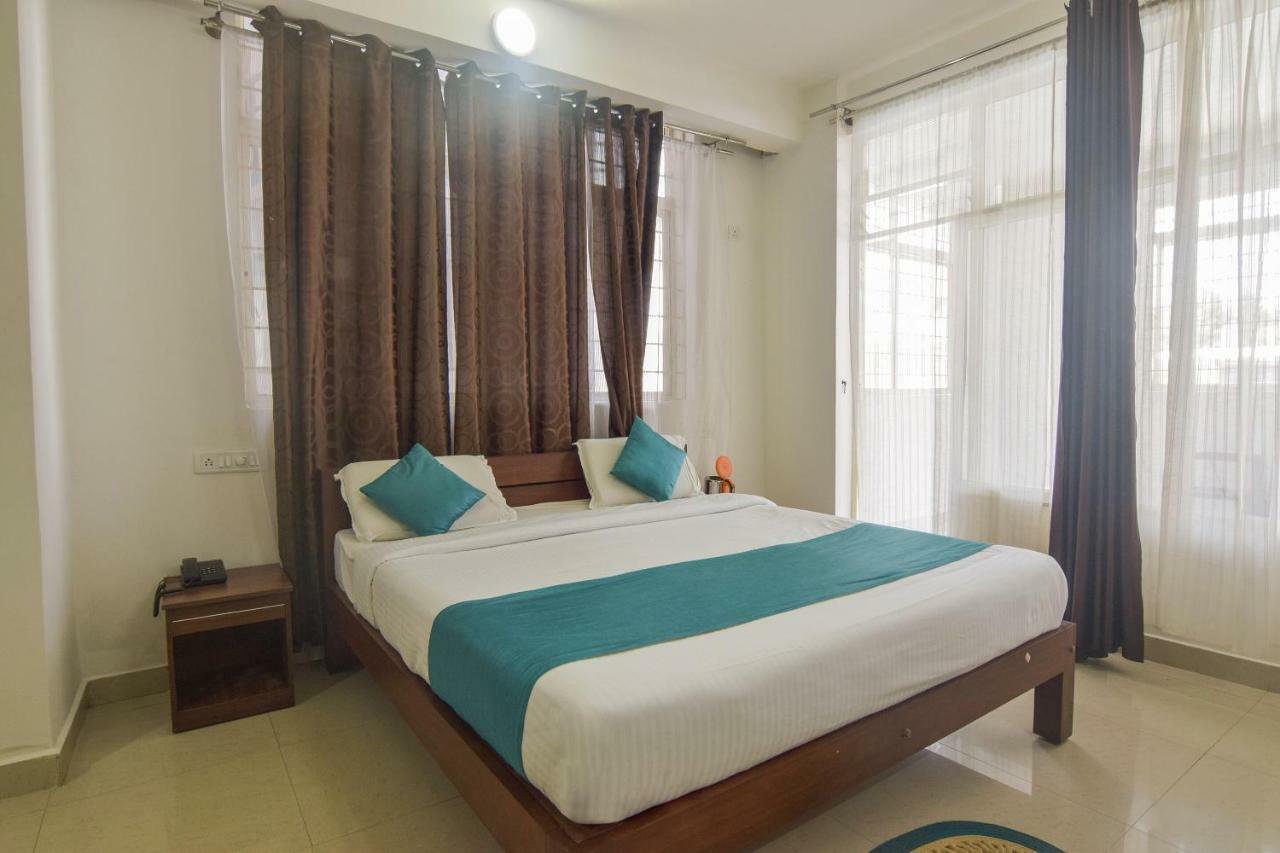 Capital O 14144 Hotel Moriz Madikeri Dış mekan fotoğraf